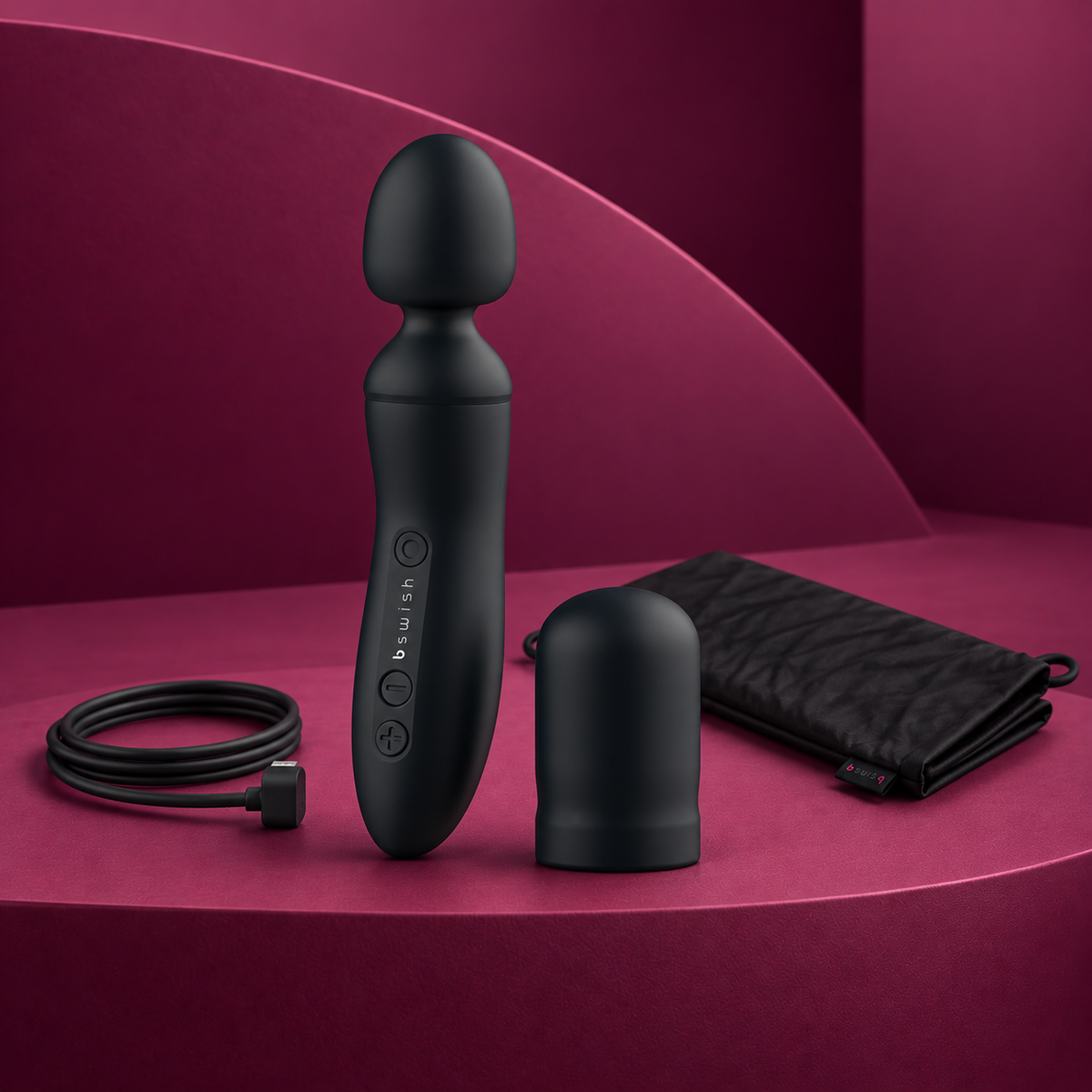 B Swish Bthrilled black wand with cap, charging cable and pouch on red geometric background