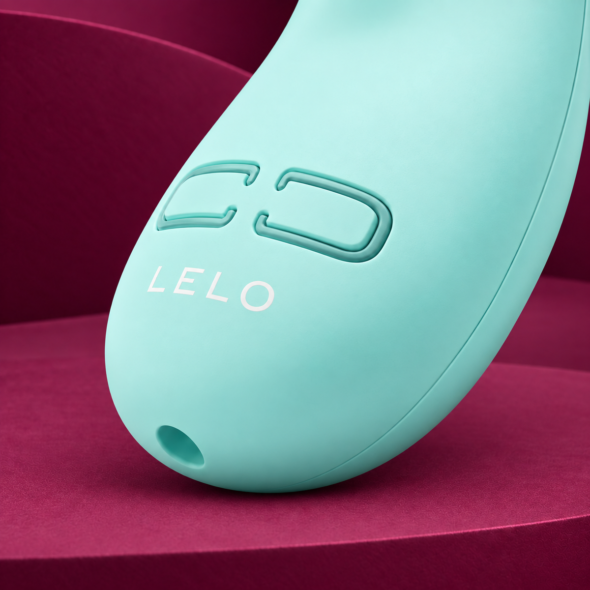 LELO Lily 3 233262 control detail on red geometric background