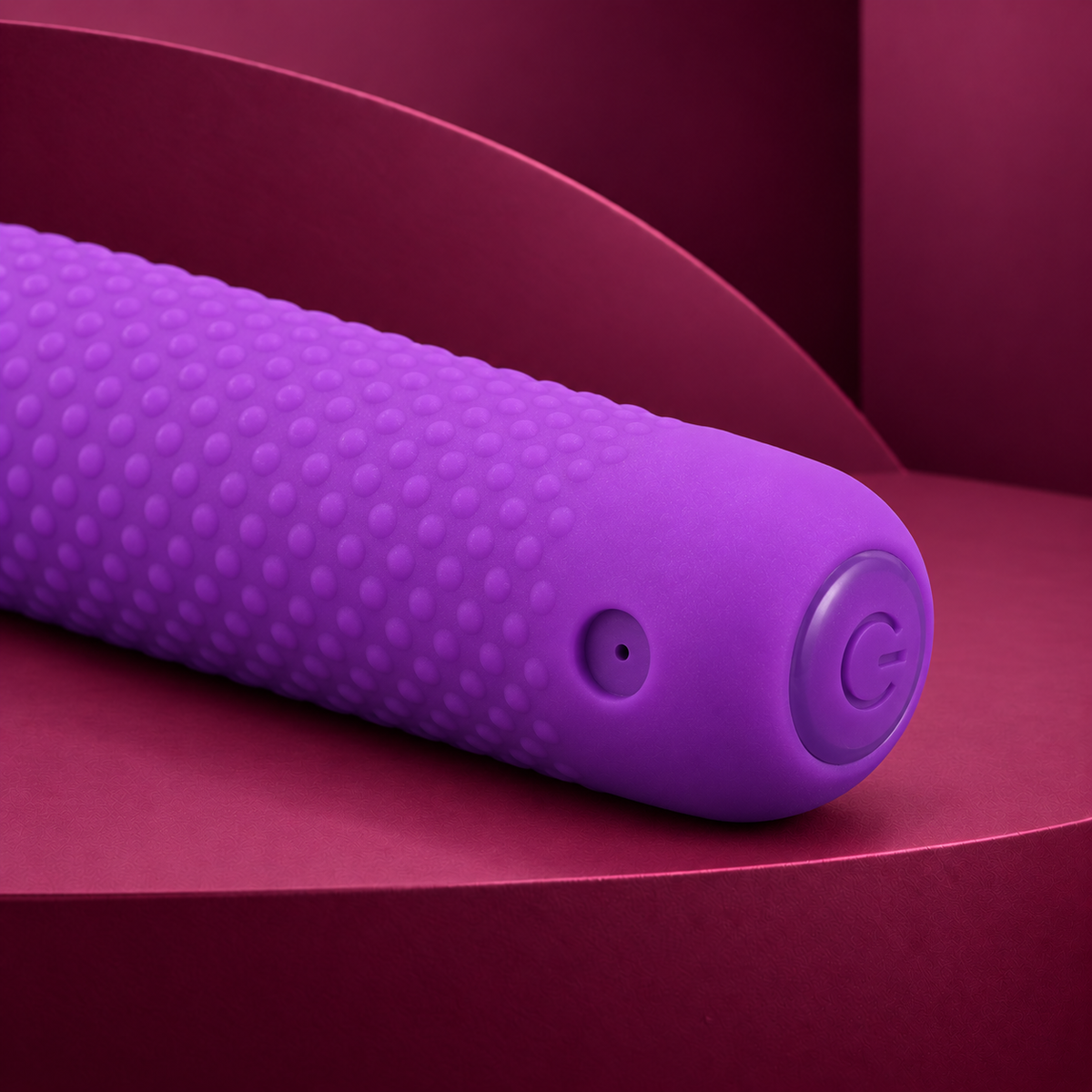 Armony purple massager control and charging detail on red geometric background