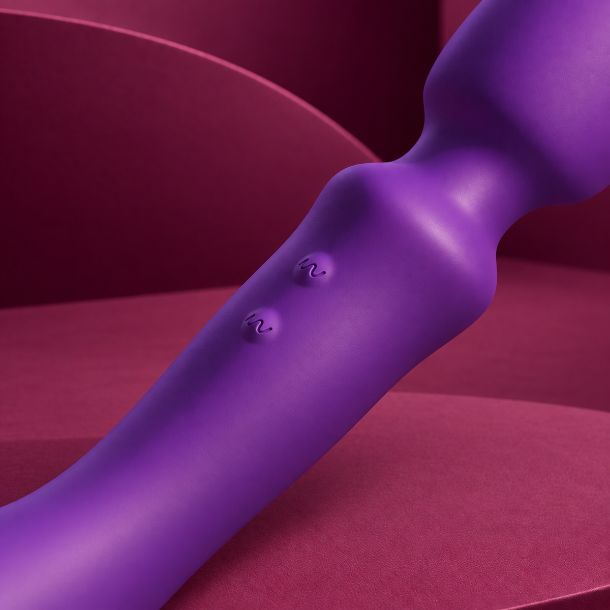 She.e.o purple wand with two wave controls and sculpted neck close detail on red geometric background