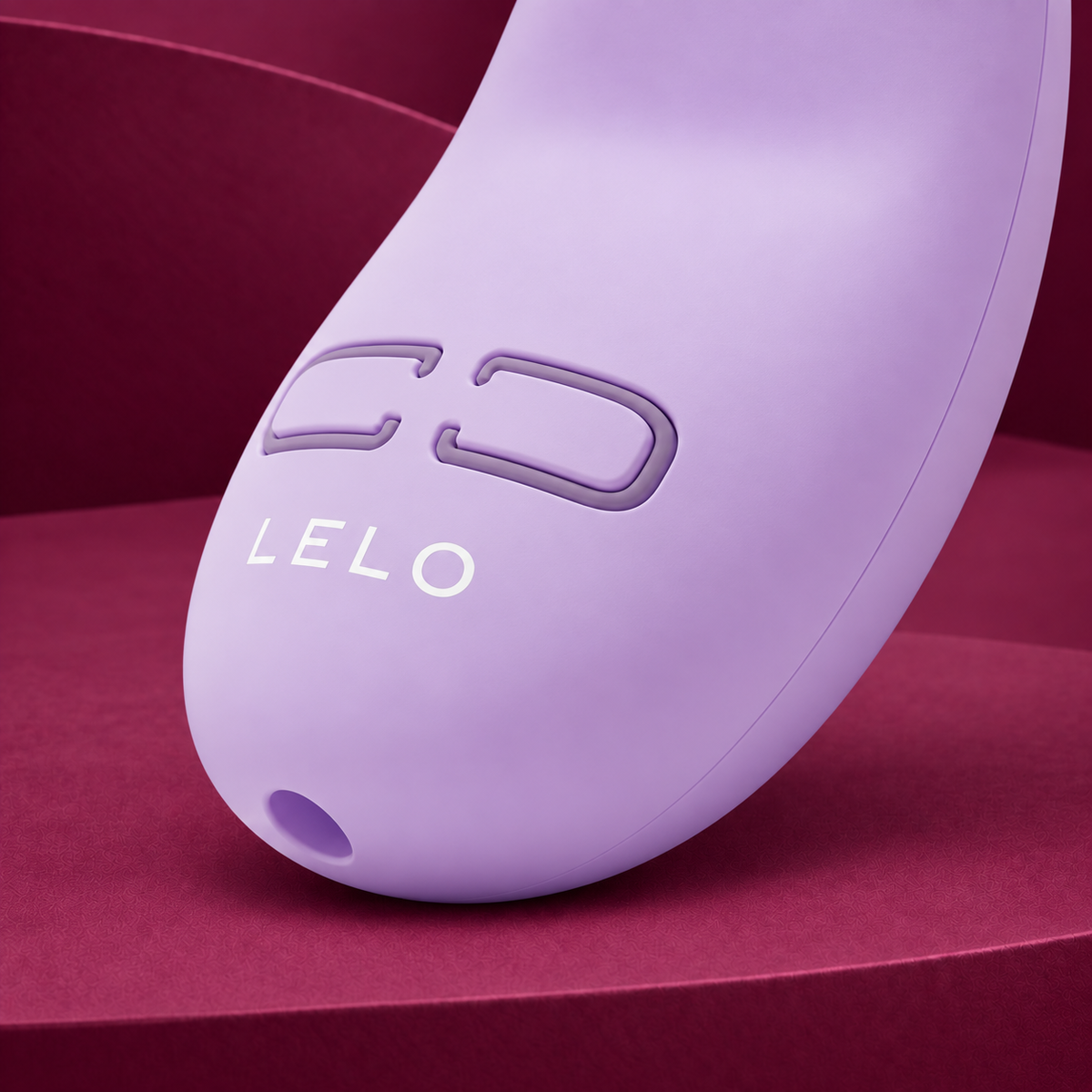 LELO Lily 3 233263 control detail on red geometric background